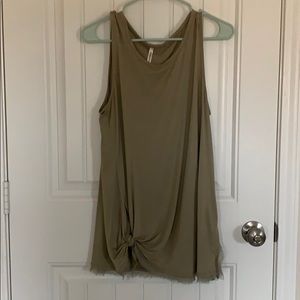 olive green sleeveless tunic.